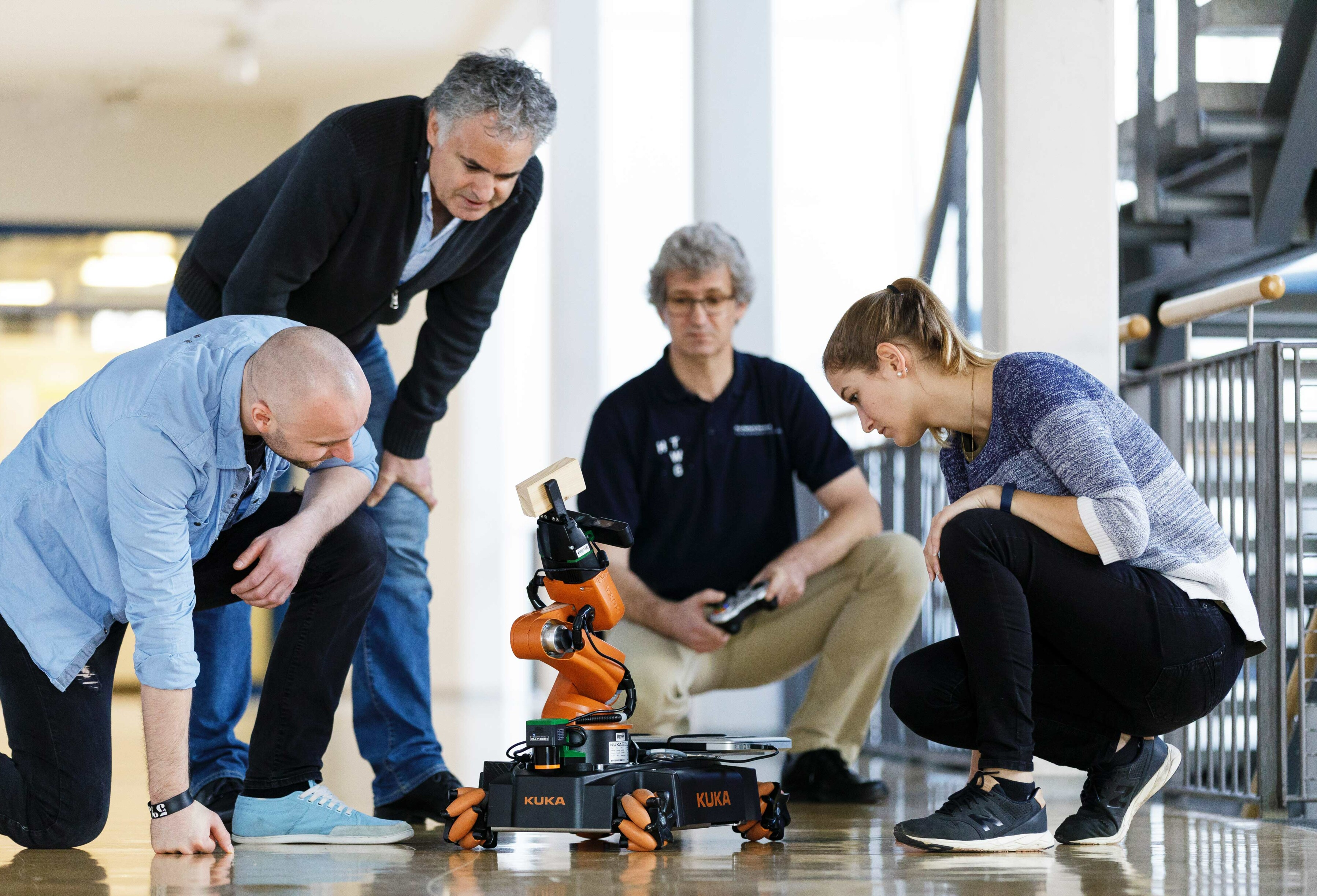 Professor and Student with the KUKA robot.